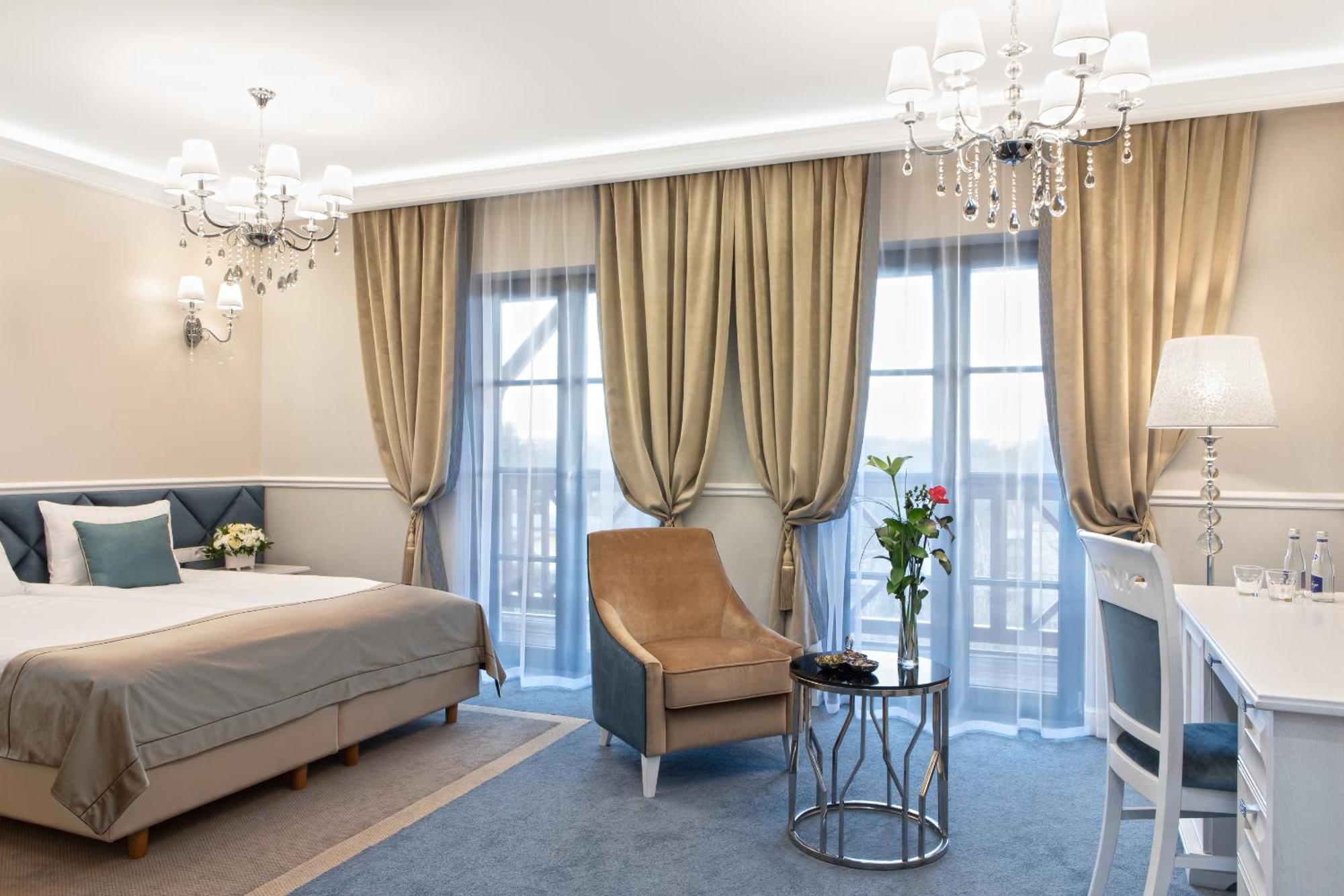 Boutique Odyseja & Spa チェホチネク エクステリア 写真 A room at the hotel