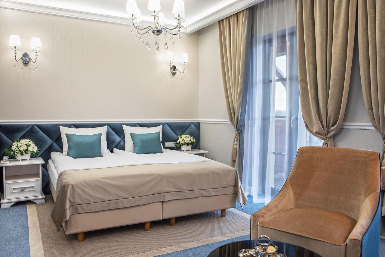 Boutique Odyseja & Spa チェホチネク エクステリア 写真 A room at the hotel